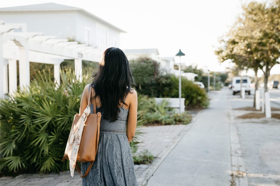 girl walking to the beach