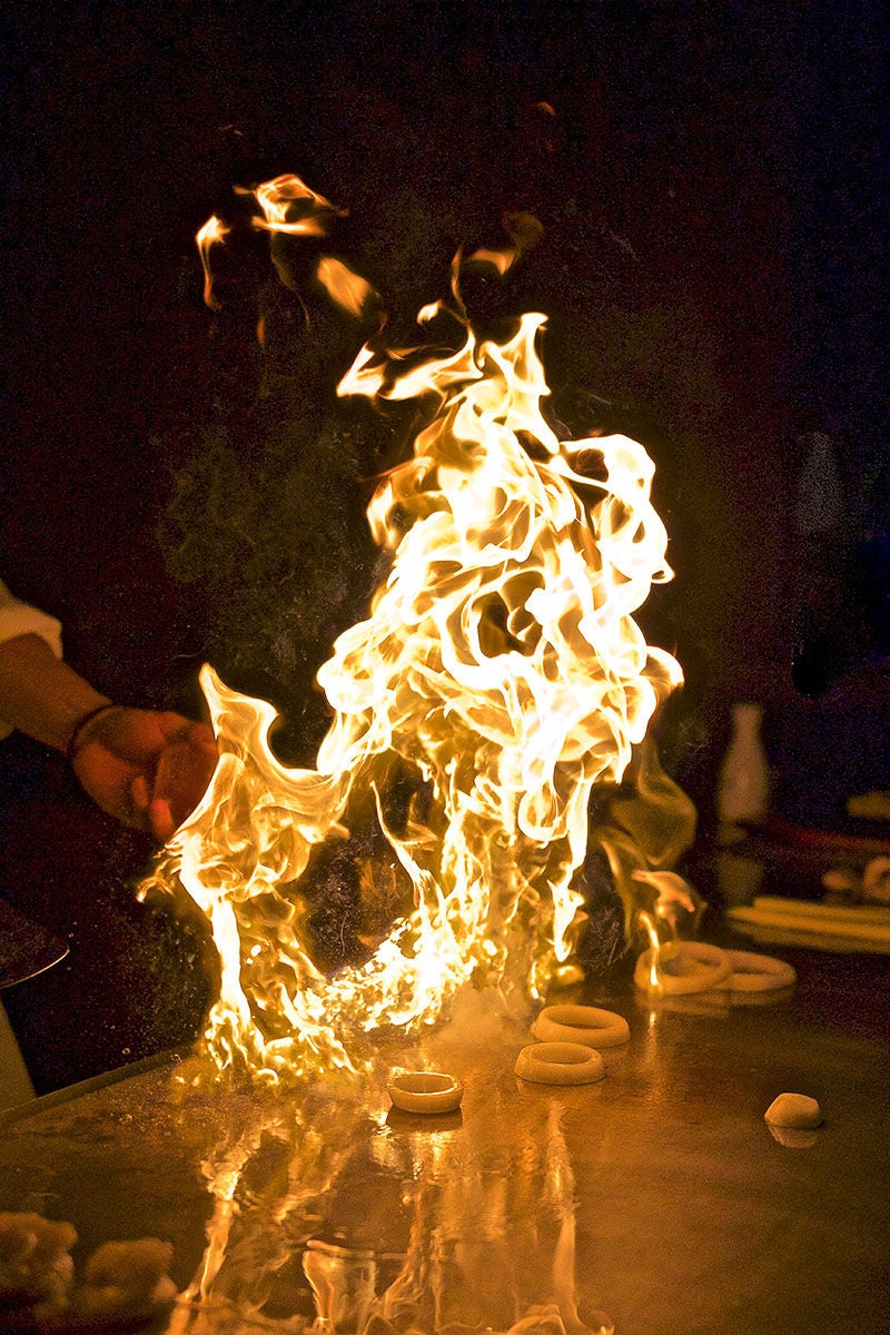 Hibachi grill with flames 